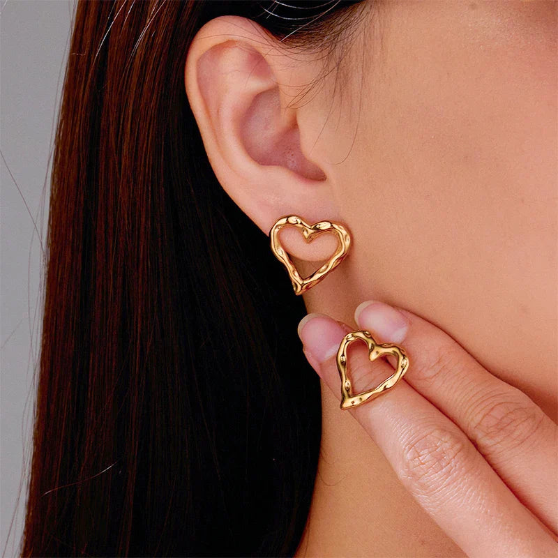 RIGGED OPEN HEART EARRINGS