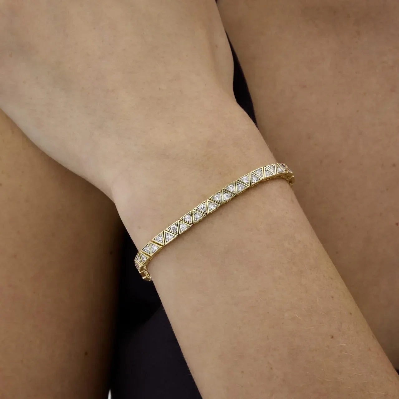 Elegant Gold Plated Criss Cross Tennis Bracelet with Sparkly Zircon Stones