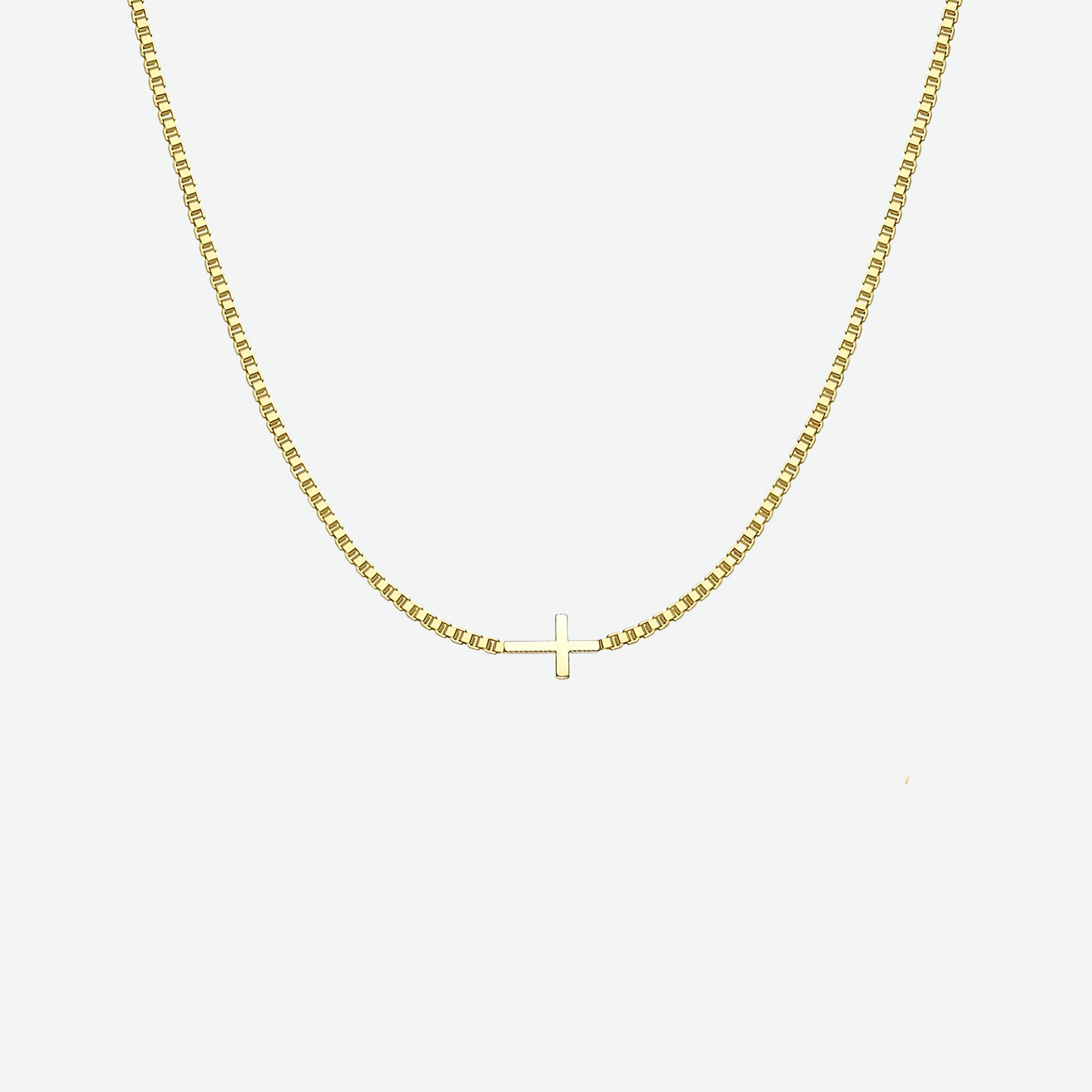 GOLD SIDE CROSS NECKLACE